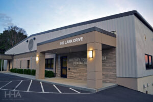 Image of Whitney Young Health Dental Practice, a modern tan and beige structure.